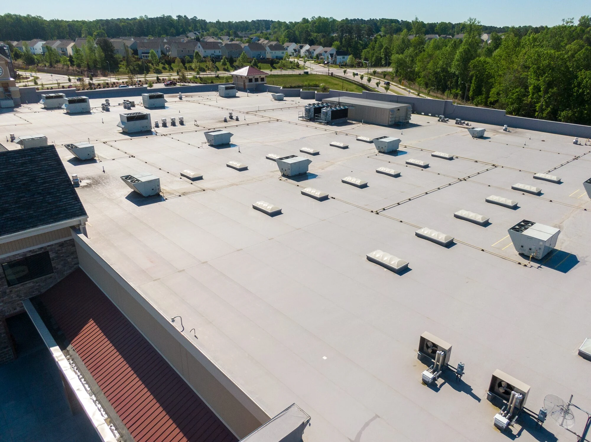 Large commercial flat roof ready for inspection and replacement planning